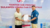 Kepala OJK Provinsi Sulawesi Utara dan Gorontalo, Robert H. P. Sianipar bersama Pimpinan PT Pergadaian Mas Sinar